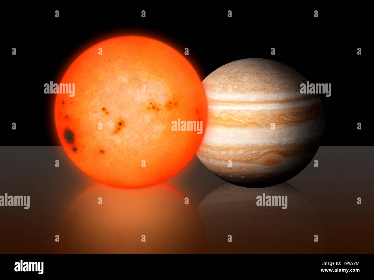 Trappist-1 est une étoile naine rouge variété la plus ΓÇô ΓÇô situé à environ 40 années-lumière dans le Verseau. En 2015, les astronomes ont découvert que l'hôte de Trappistes-1 a été trois planètes de la taille de la terre. Alors il est venu sous les projecteurs de nouveau en 2017 lorsque les scientifiques de la NASA ont trouvé quatre autres planètes, en tenant le total à sept. Trappist-1 est seulement légèrement plus grand que Jupiter en diamètre ; cette image montre-les sur la même échelle. C'est le plus planètes terrestres qui n'ont jamais été trouvés en orbite autour d'une seule étoile, y compris notre propre système solaire. Banque D'Images