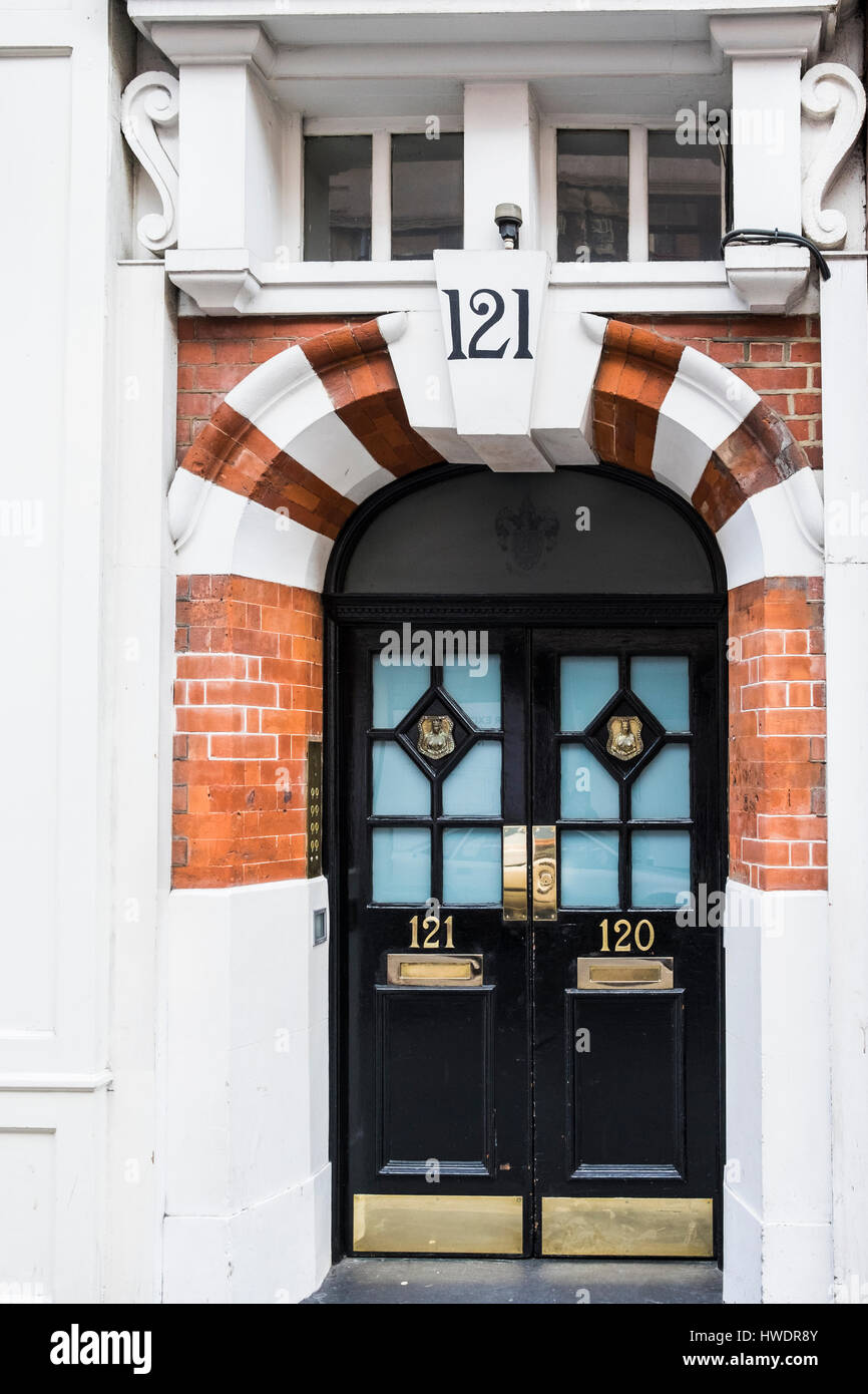 Arch brique porte, Long Acre, Covent Garden, Londres, Angleterre, Royaume-Uni Banque D'Images