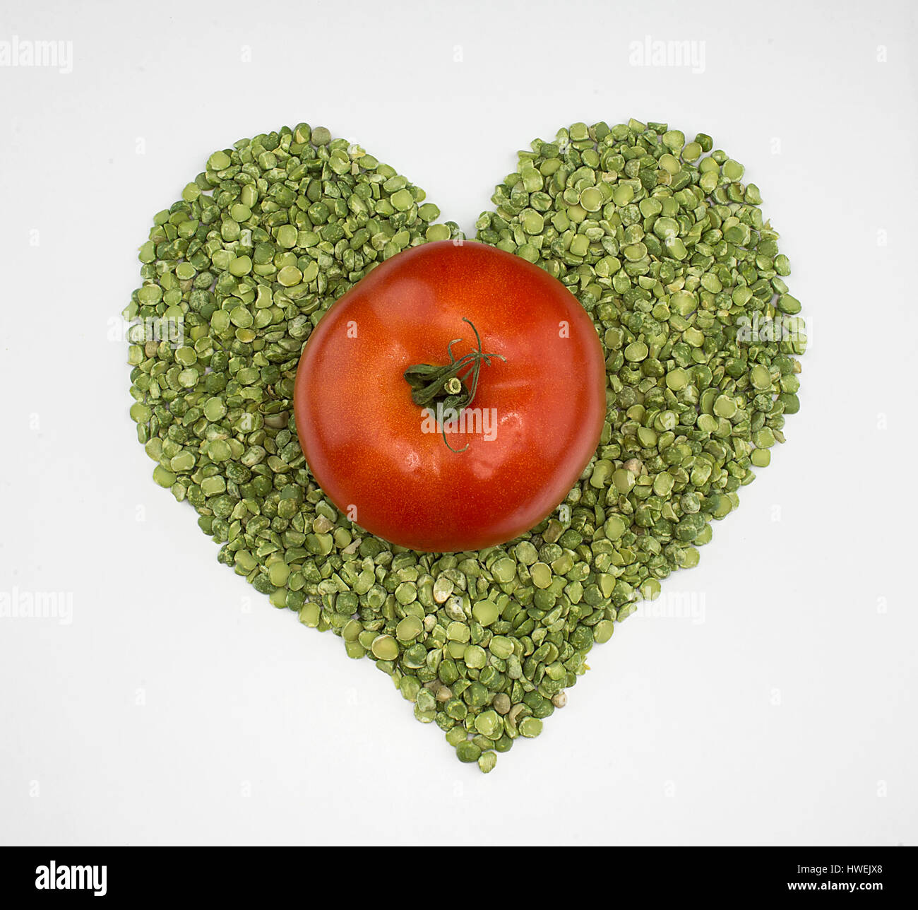 Coeur de la tomate et les pois verts Banque D'Images