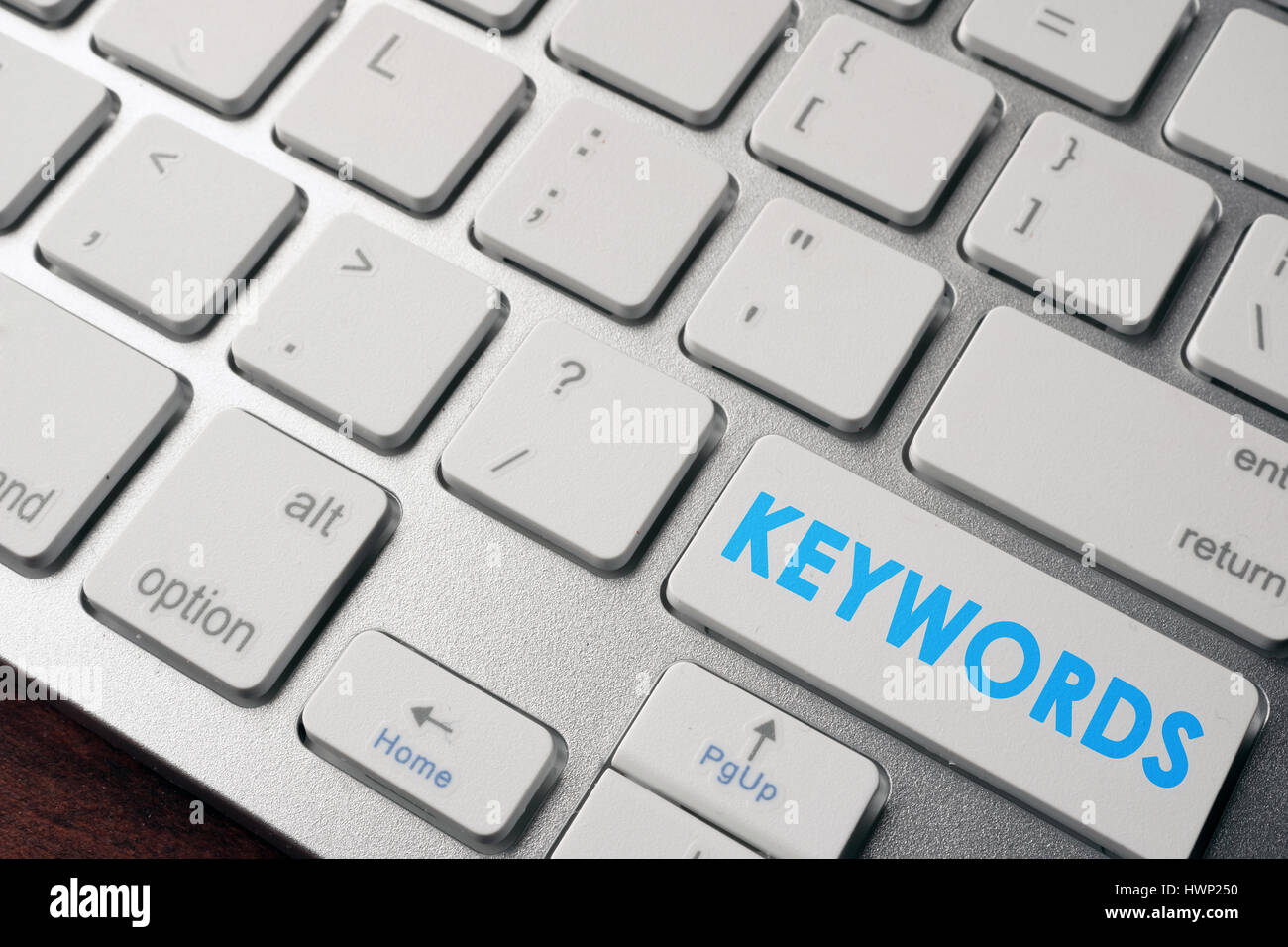 Mots-clés sur un bouton du clavier. Concept de SEO. Banque D'Images