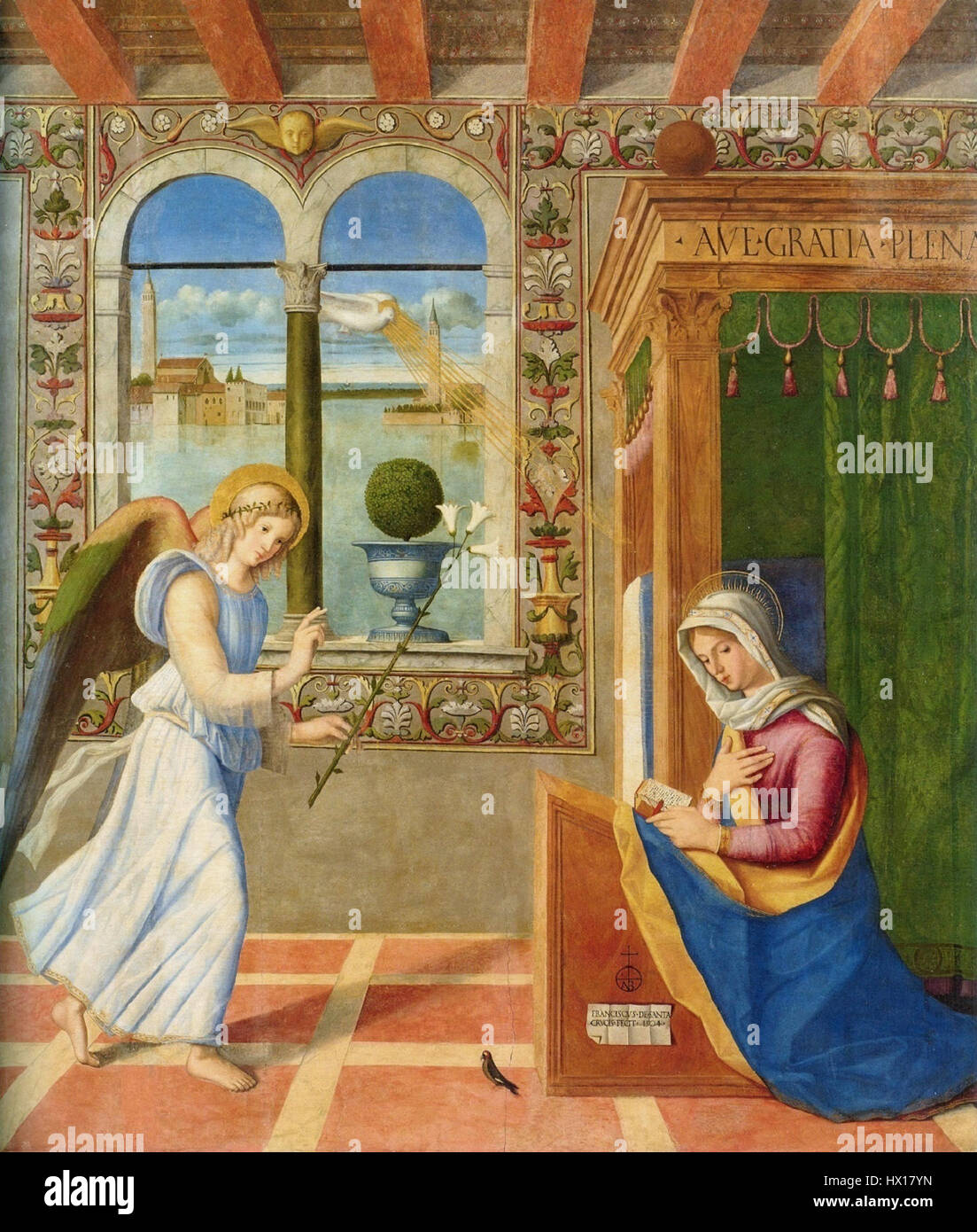 'Annonciation' de Francesco di Simone da Santacroce (1504) est une œuvre clé de la Renaissance italienne. La peinture, présentée à la Pinacothèque Carrara de Bergame, met en valeur la maîtrise des thèmes religieux par l’artiste, dépeignant la scène biblique de l’annonce de l’ange Gabriel à la Vierge Marie. Banque D'Images