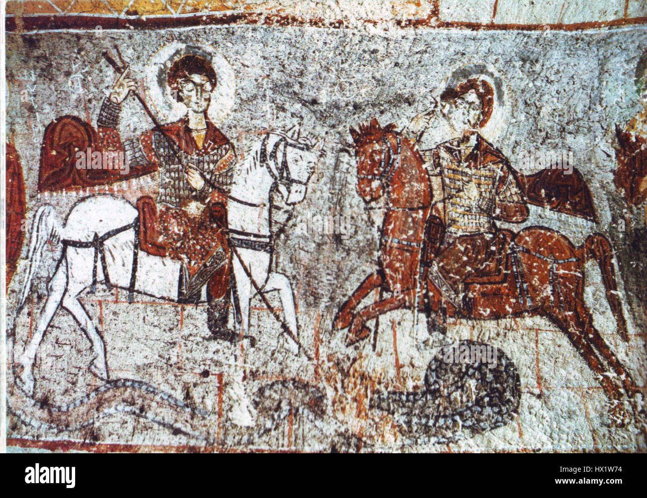 Saints Georges et Théodore d'Amasée, représentés tuant un dragon, dans une œuvre d'art d'un artiste inconnu. Banque D'Images