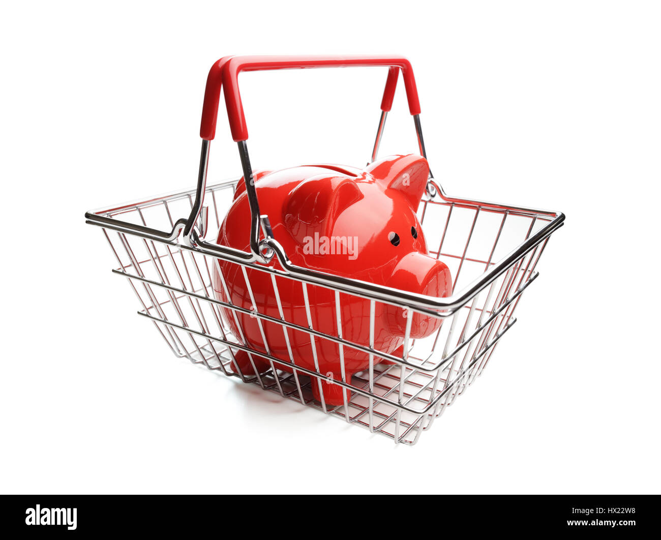 Tirelire en panier sur fond blanc concept pour coût de l'épicerie Banque D'Images