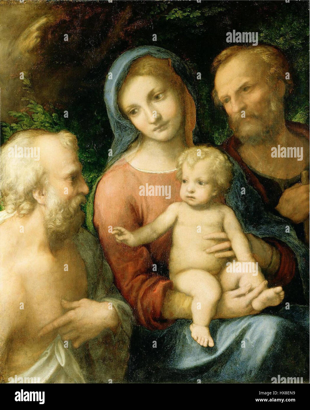 « La Sainte famille avec Saint Jérôme » d’Antonio Allegri Correggio, peint entre 1517 et 1519, représente la Vierge Marie, l’enfant Jésus, et Saint Jérôme dans un cadre serein et intime. L'utilisation de la lumière et de la perspective par Correggio démontre sa maîtrise du style de la haute Renaissance, en se concentrant sur la chaleur et l'émotion humaine. Banque D'Images
