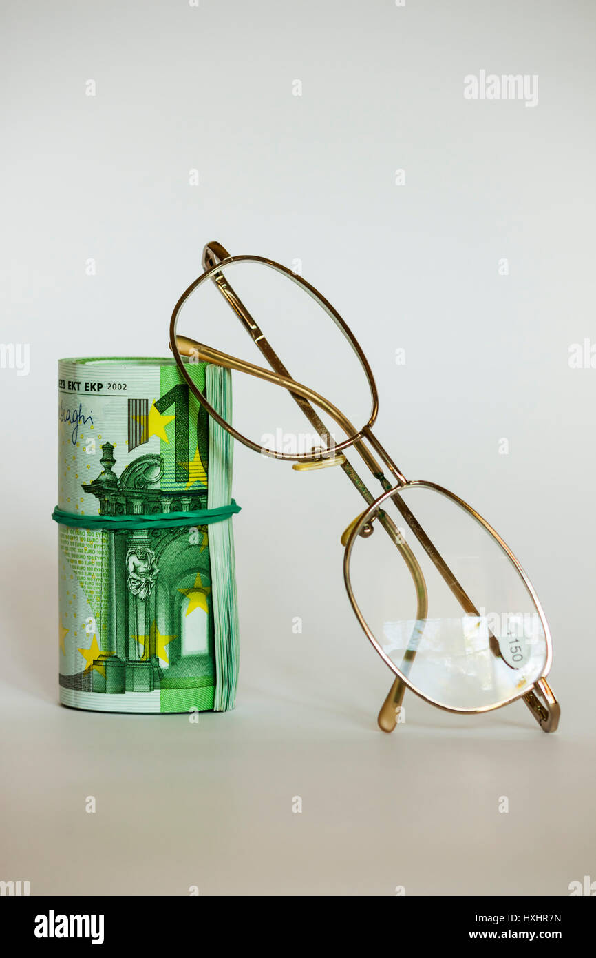 Du rouleau de l'argent et les verres d'oeil Banque D'Images