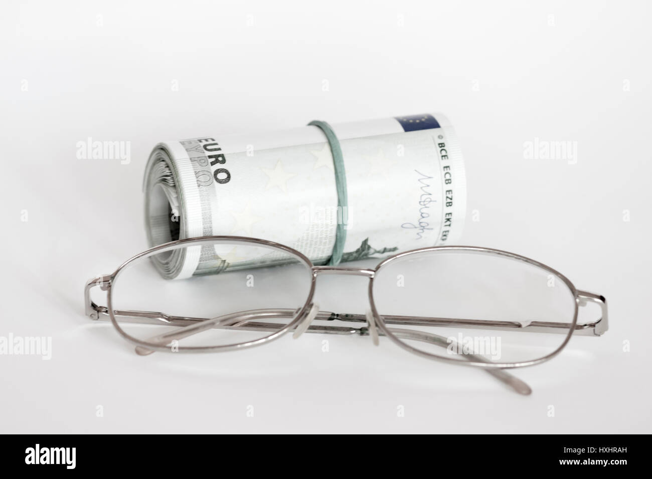 Du rouleau de l'argent et les verres d'oeil Banque D'Images