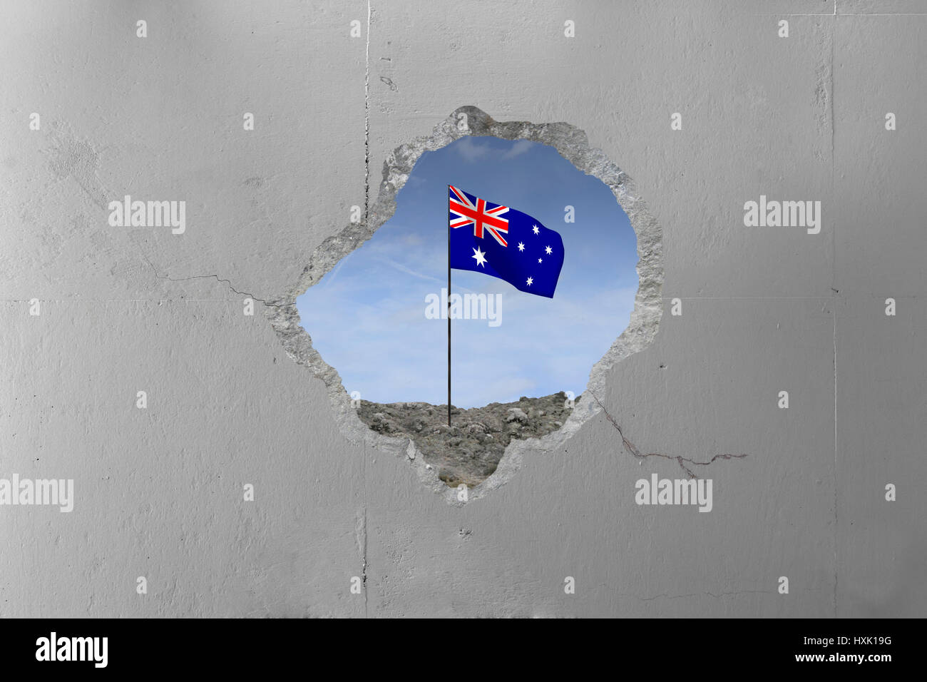 Drapeau australien derrière un mur de béton. Banque D'Images