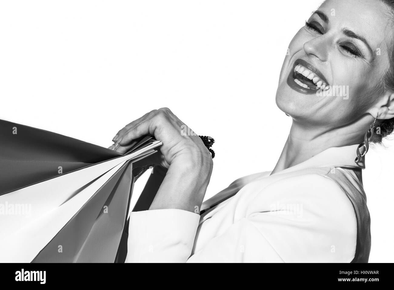 Le Shopping. L'approche française. Fermer portrait of happy young woman with shopping bags les couleurs du drapeau français sur fond blanc Banque D'Images