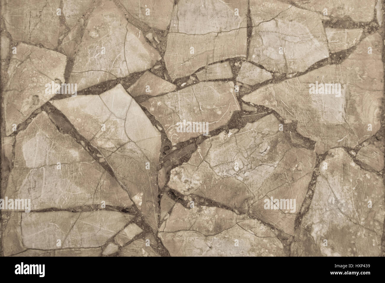 Craquelé teinté de pierres naturelles Mur avec structure et profondeur Banque D'Images