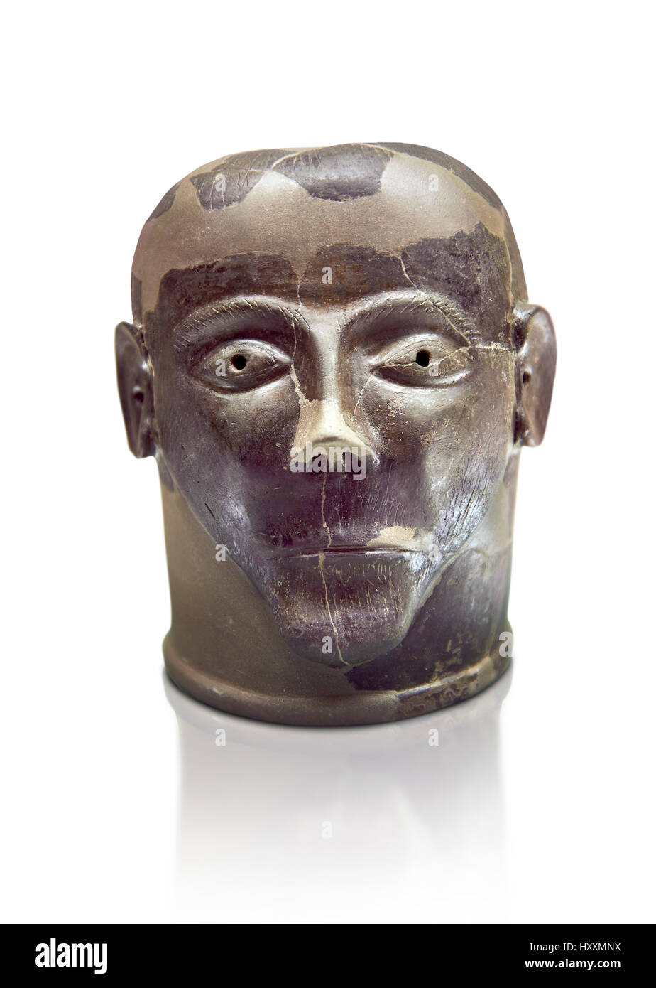 6ème siècle avant J.C. tête d'argile dans Chiusi, inv 94619, Musée Archéologique National de Florence, Italie , fond blanc Banque D'Images