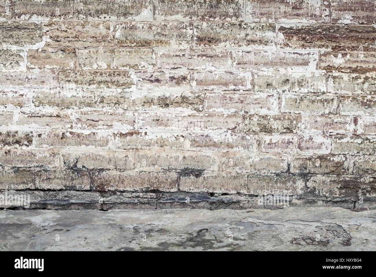 Vieux Mur de blocs de béton et d'asphalte, texture de fond d'intérieur vide abstrait Banque D'Images