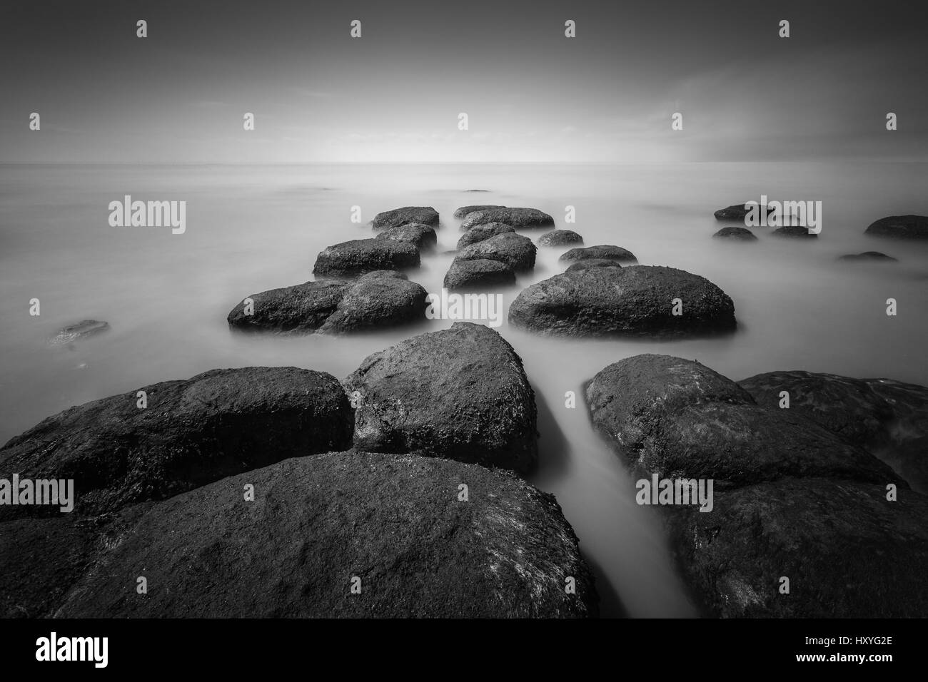 Hunstanton rochers en mer, d'une exposition longue, Norfolk Banque D'Images