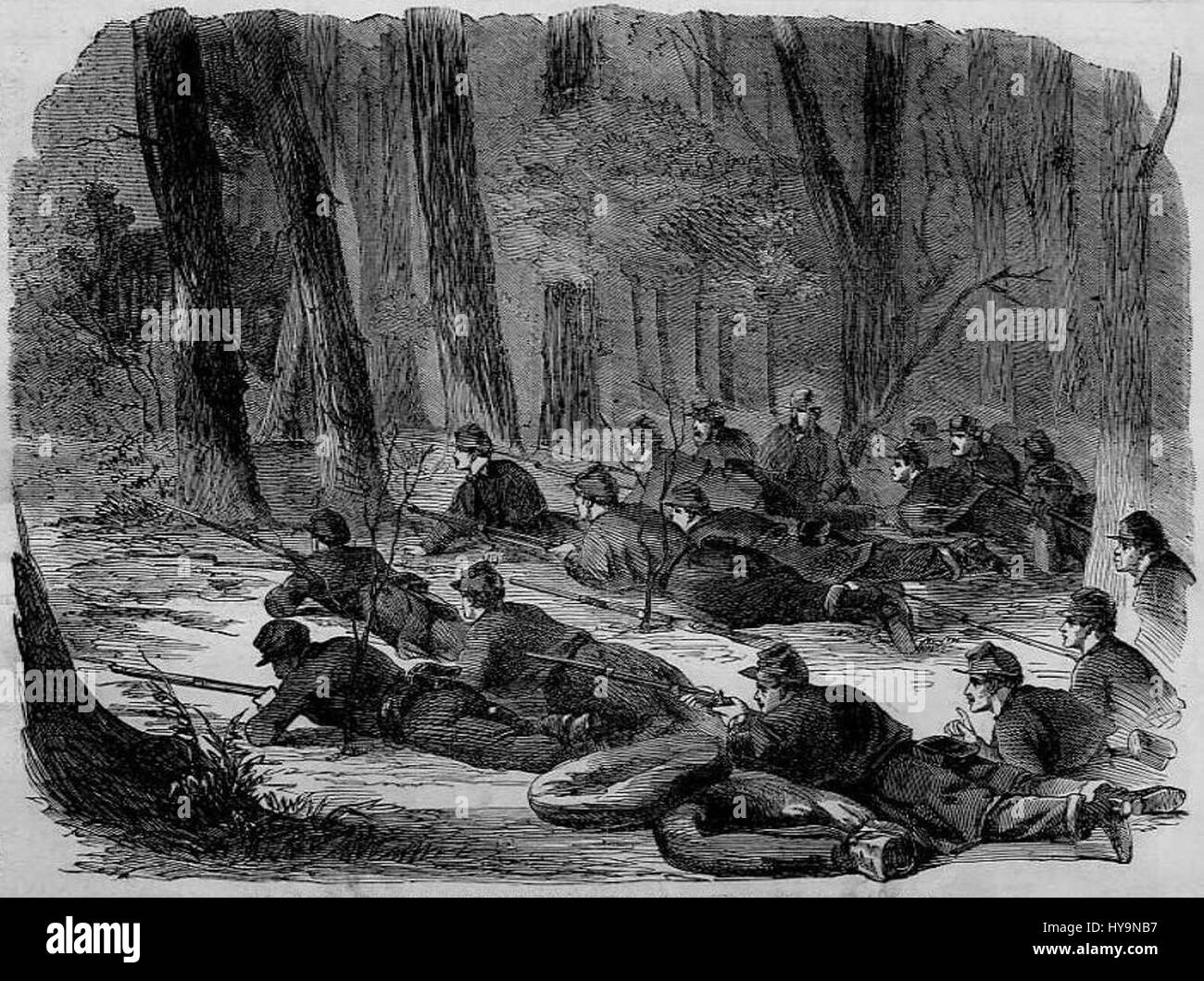 « The Army of the Potomac : Our Outstanding Picket in the Woods » capture un moment de la guerre de Sécession, représentant des soldats stationnés à un piquet de grève dans la forêt, protégeant contre les forces ennemies. Banque D'Images