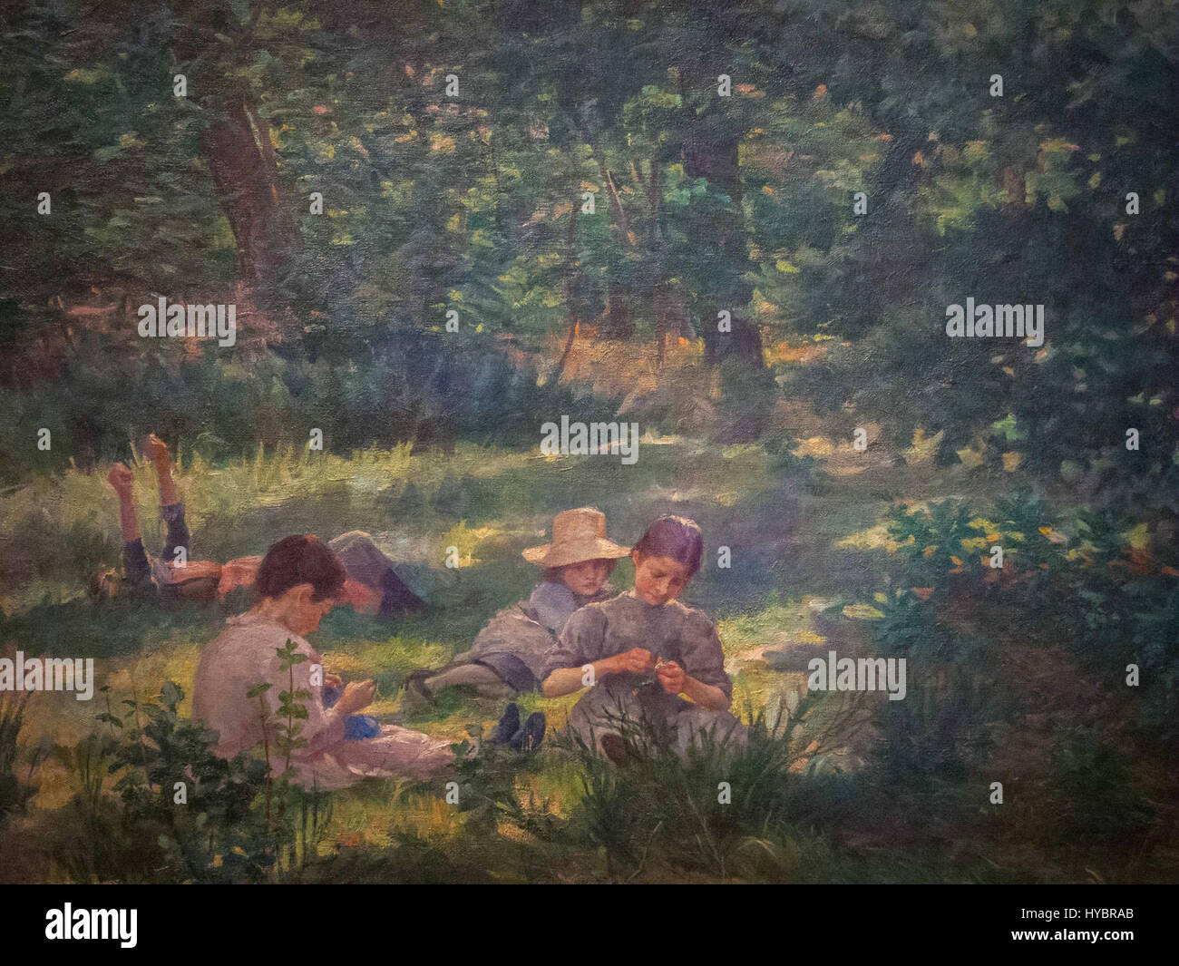 'Otroci v travi' (enfants dans l'herbe) est une peinture de l'artiste slovène Ivana Kobilca, représentant des enfants jouant dans un champ herbeux, mettant en valeur son accent sur la vie quotidienne et les environnements naturels. Banque D'Images