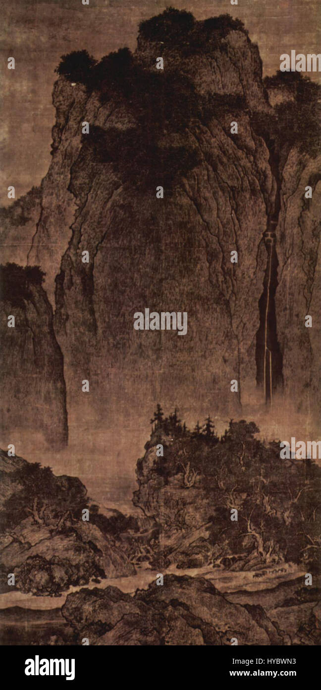 Fan K'uan était un peintre paysagiste chinois de la dynastie Song, connu pour ses œuvres monumentales qui dépeignent la grandeur de la nature. Sa peinture '001' présente des montagnes imposantes et de vastes scènes naturelles, caractéristiques de son style détaillé et atmosphérique qui souligne l'immensité de la nature. Banque D'Images