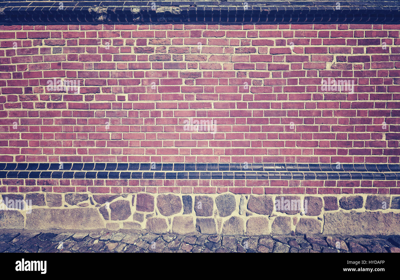 Vintage photo aux tons de brique et de pierre de mur, la texture ou l'arrière-plan. Banque D'Images