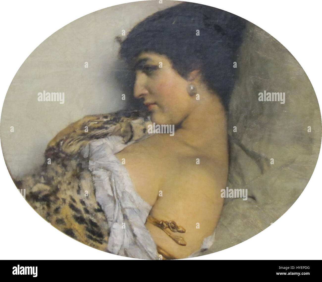 Cléopâtre de Lawrence Alma-Tadema représente la reine emblématique d'Égypte dans un moment d'opulence. La peinture souligne sa beauté royale et son environnement somptueux, typiques de l'accent mis par l'artiste sur la précision historique et les détails fins. Banque D'Images