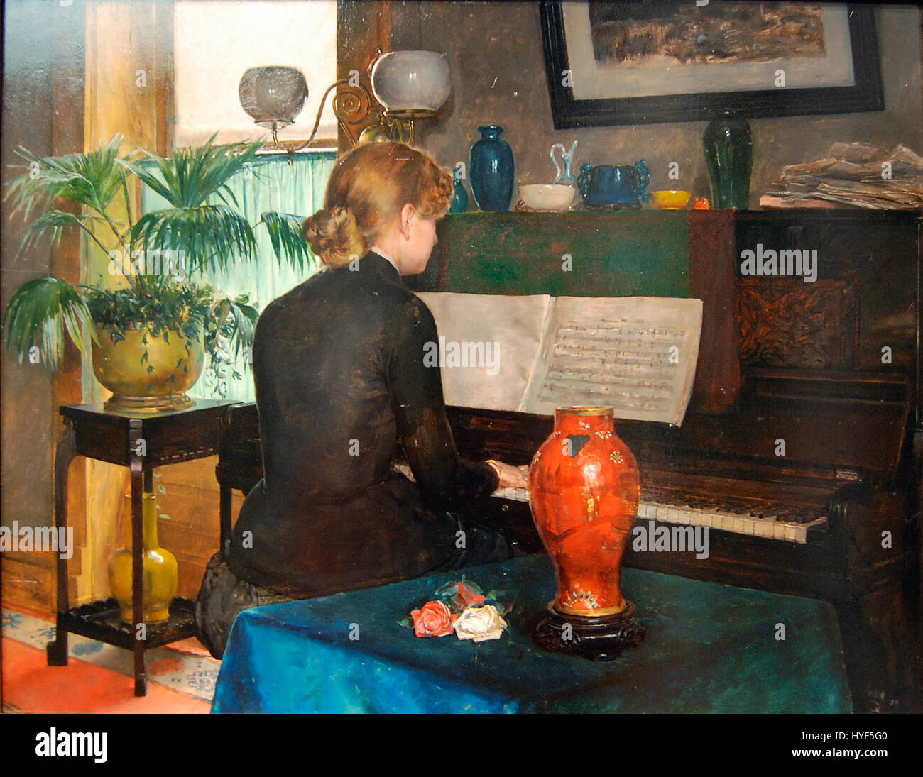 Ce tableau, 'moment musicale', de Charles Frederic Ulrich, créé en 1883, représente un moment serein de performance musicale. L’œuvre capture l’atmosphère intime d’un rassemblement musical, mettant en valeur l’harmonie entre l’interprète et le public. Banque D'Images