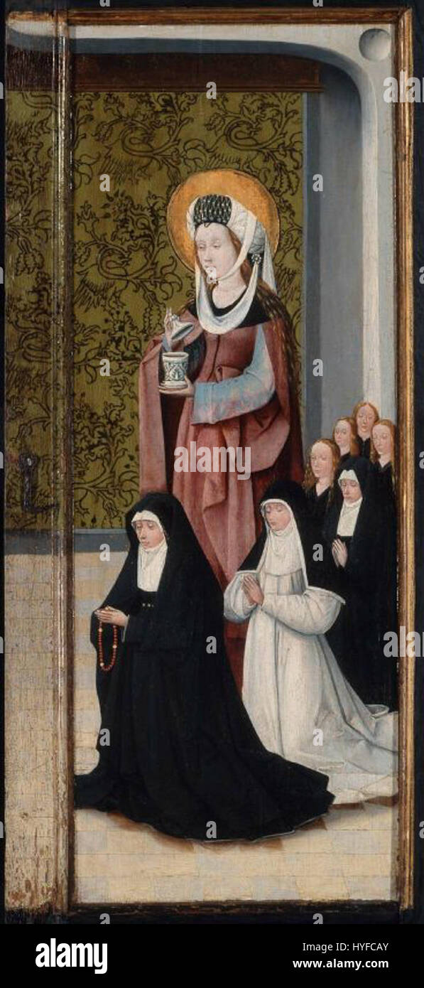 Cette œuvre, attribuée à l'atelier de Hieronymus Bosch, représente Heilwig van der Rullen et ses filles aux côtés de Sainte Marie-Madeleine. Il met en valeur le style distinctif des disciples de Bosch, mêlant symbolisme religieux et détails complexes. Banque D'Images