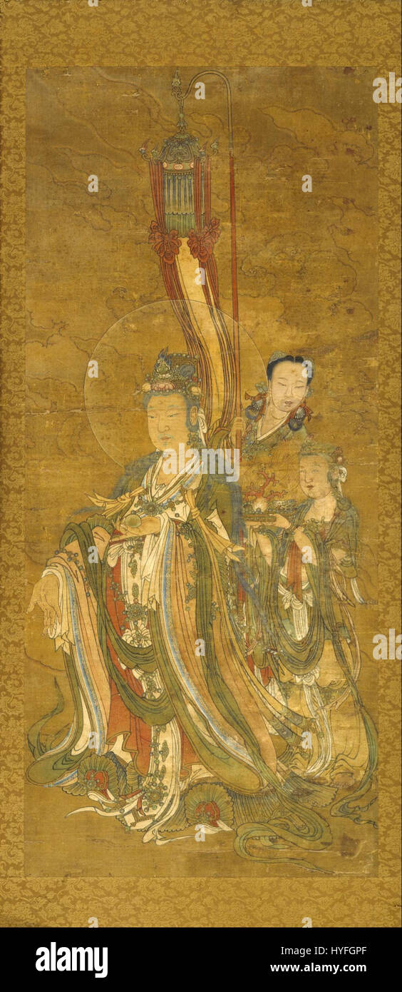 Cette sculpture d'un Bodhisattva chinois, accompagnée par des accompagnateurs, met en valeur le style artistique bouddhiste de la Chine. La figure représente la compassion et la sagesse, attributs essentiels du bodhisattva, et est un exemple d'art religieux de la dynastie Tang ou Song. Banque D'Images