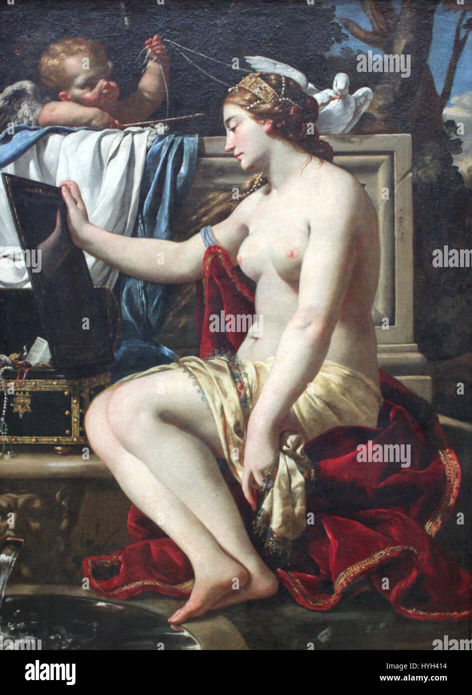 Dans ce tableau de 1626 'les toilettes de Vénus' de Vouet, l'artiste dépeint la déesse romaine Vénus dans une scène mythologique, en se concentrant sur la beauté, la sensualité et les thèmes divins communs dans le baroque Banque D'Images