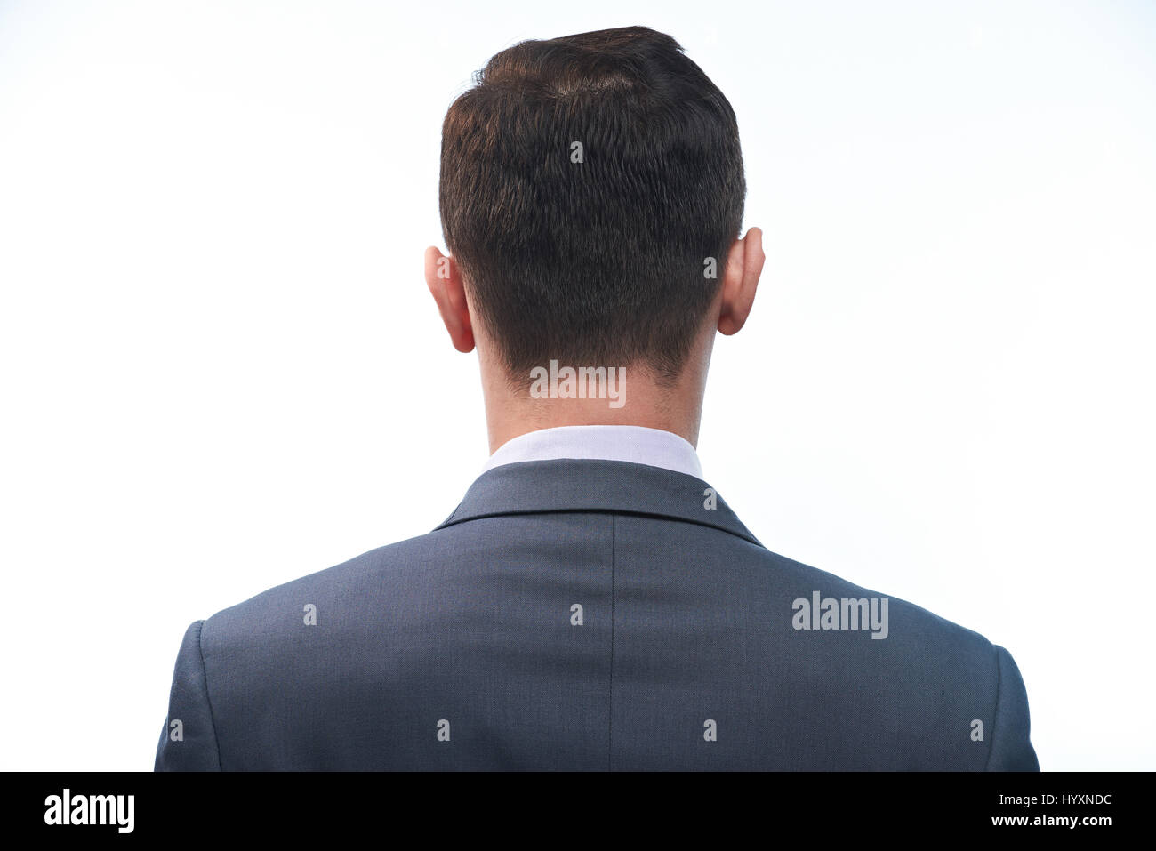 Man in suit close-up view fom retour isolé sur fond blanc Banque D'Images