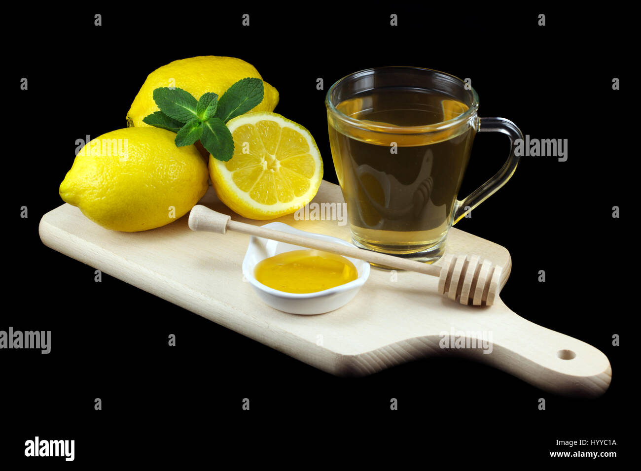 Le thé chaud de citrons et miel Banque D'Images