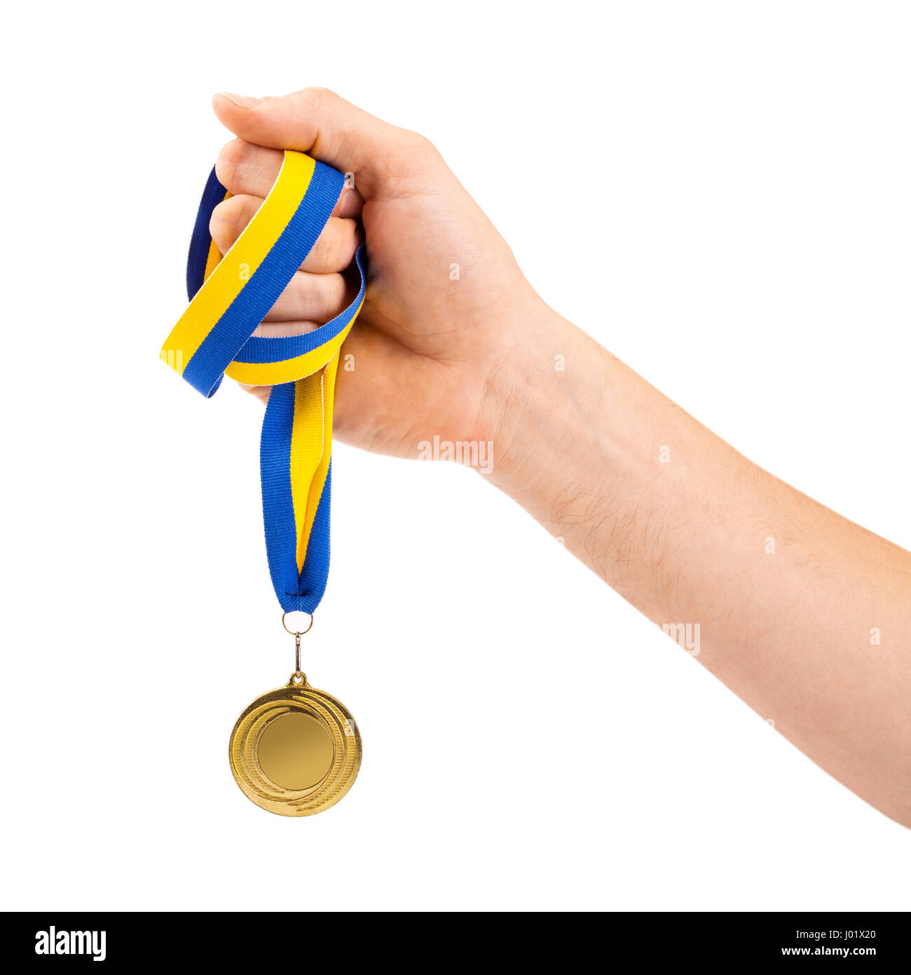 Médaille d'or dans la main sur fond blanc Banque D'Images