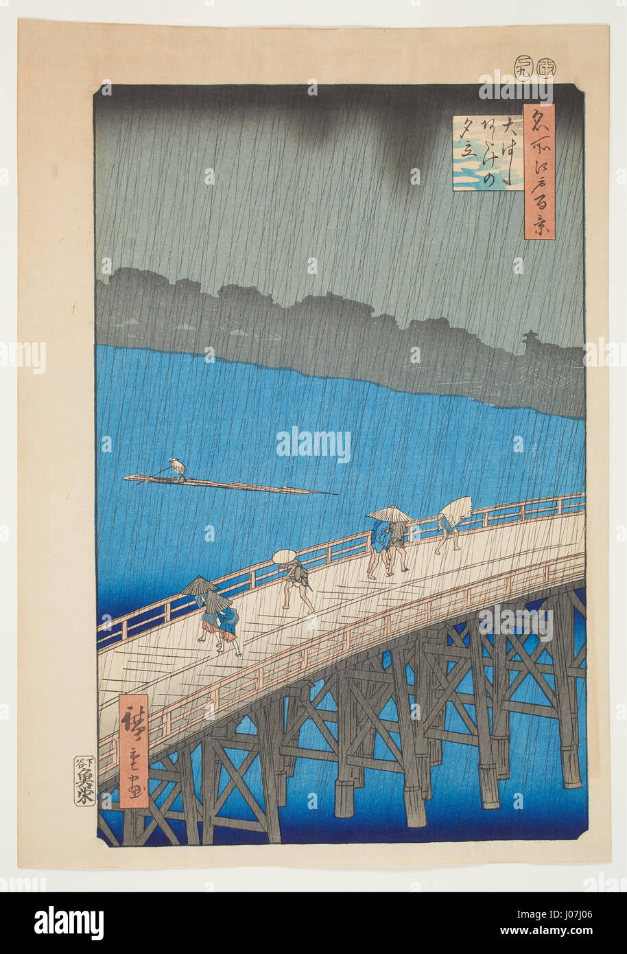 *Downverse at Ohashi Bridge, Atake*, de la série *cent vues célèbres d'Edo* par Ando Hiroshige, représente une tempête de pluie au pont d'Ohashi à Edo (Tokyo moderne). L'imprimé sur bois illustre la maîtrise d'Hiroshige dans la capture des conditions atmosphériques et du mouvement dynamique de la pluie, avec des personnages traversant le pont sous l'averse. Banque D'Images