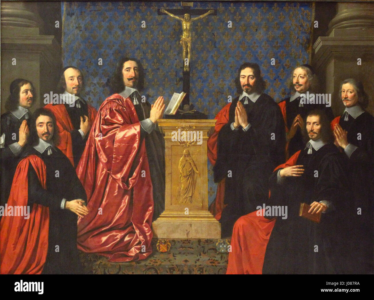 Le Prévôt des marchands et les échevins de la ville de Paris de Philippe de Champaigne (1648) représente une Assemblée formelle à Paris, mettant en vedette d'importantes personnalités politiques de l'époque. Ce tableau est une représentation clé de la société et de la gouvernance françaises du XVIIe siècle. Banque D'Images