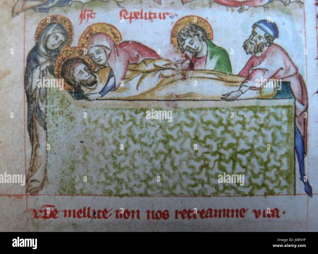 Cette peinture religieuse représente l'enterrement du Christ, capturant la tristesse et la solennité du moment. L’œuvre souligne le poids émotionnel profond du sacrifice du Christ et le début de son récit de résurrection. Banque D'Images