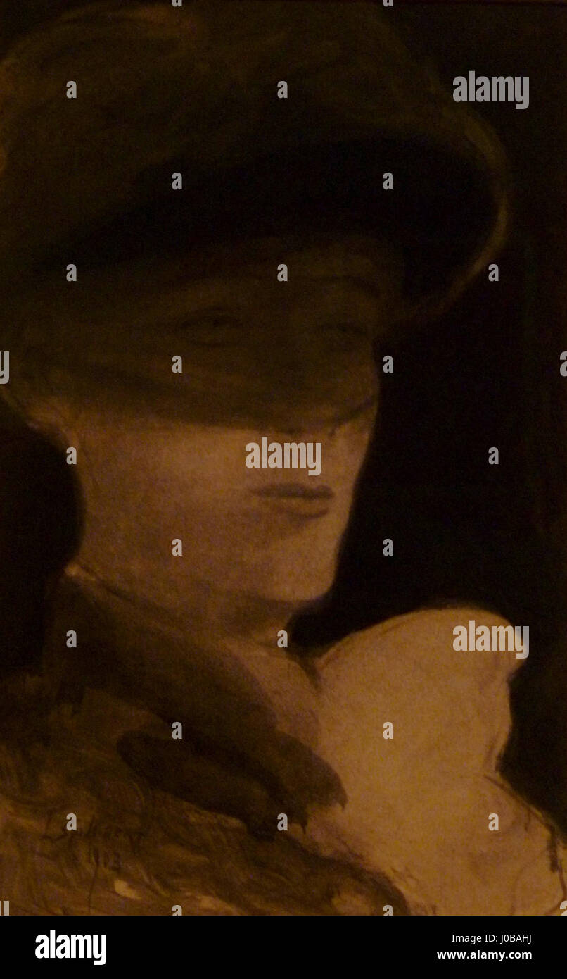 « Dame met voile » de Léon Spilliaert, créée en 1903, met en scène une femme drapée d’un voile, suggérant à la fois mystère et élégance. Les contrastes frappants et le cadre minimaliste soulignent l'intensité émotionnelle du sujet. Banque D'Images