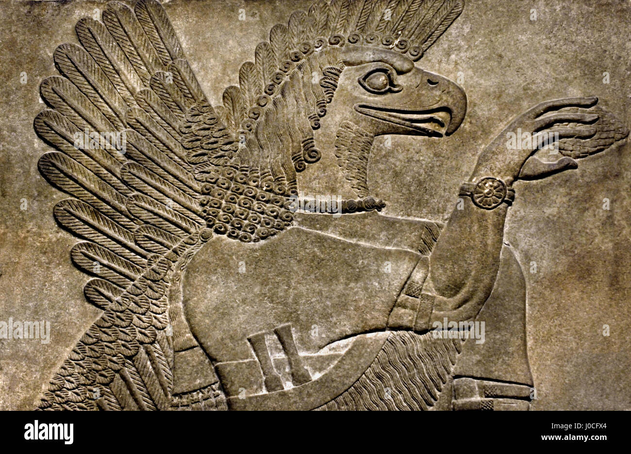 Esprit protecteur 865 - 860 av. du Palais Royal d'Assurnazirpal II Nimrud 883-859 av. J.-C. en Mésopotamie Iraq Kalhu Assyrie Banque D'Images