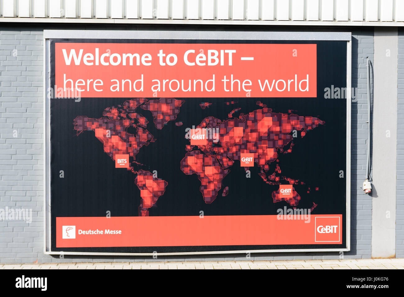 Hanovre, Allemagne - le 22 mars 2017 : une affiche de la CeBIT à un mur à l'intérieur de la foire CeBIT publicité pour événements dans le monde entier. Banque D'Images