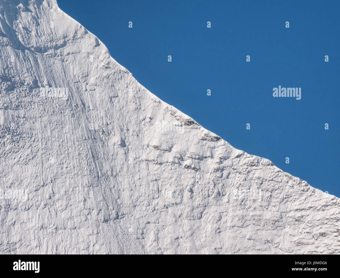 Apogée Jambeyang avec fond de ciel bleu, le Parc National de Daocheng Yading, Sichuan, Chine. Banque D'Images