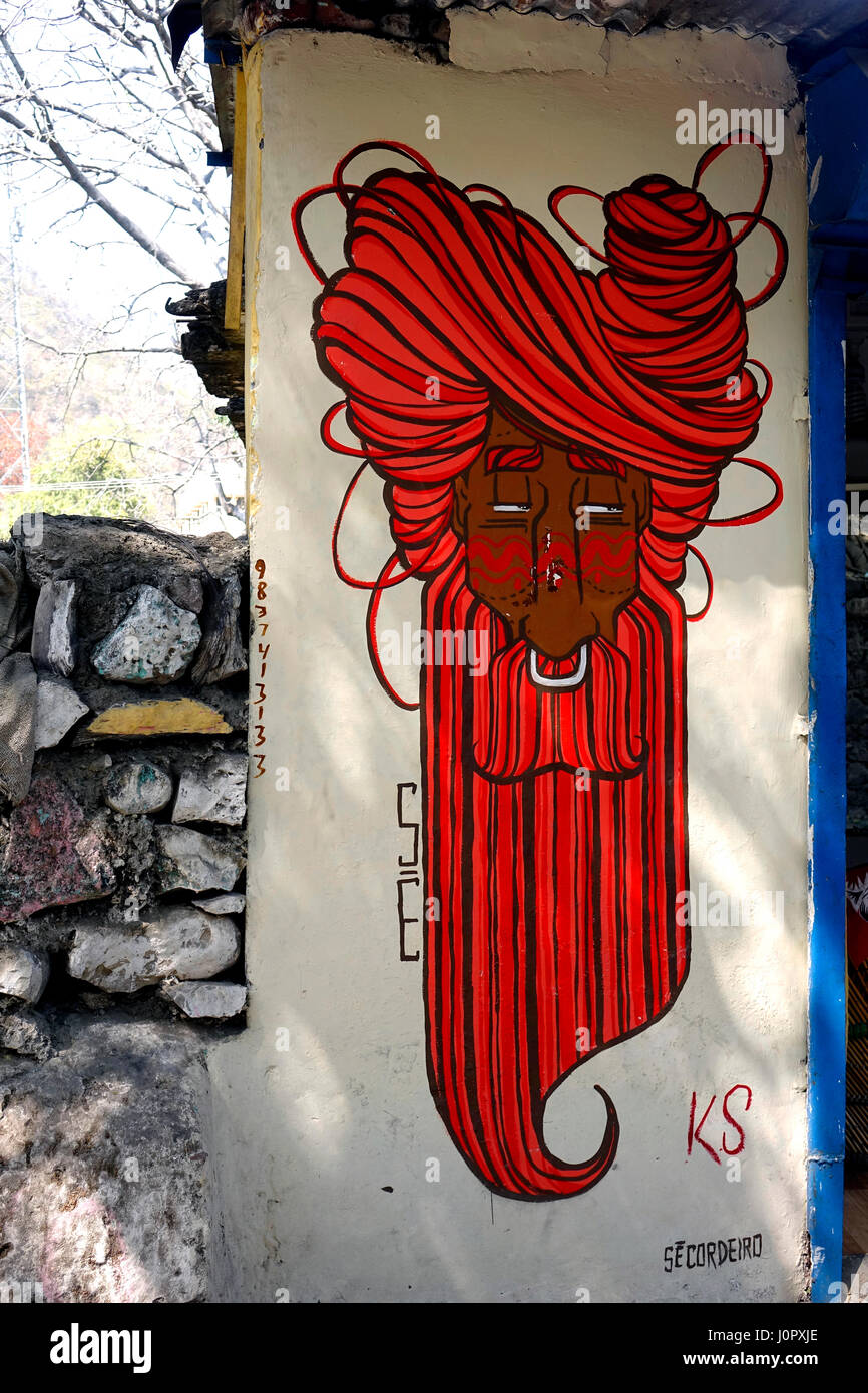 Street art de saint homme avec les cheveux longs et la barbe, Rishikesh, Uttarakhand, Inde Banque D'Images