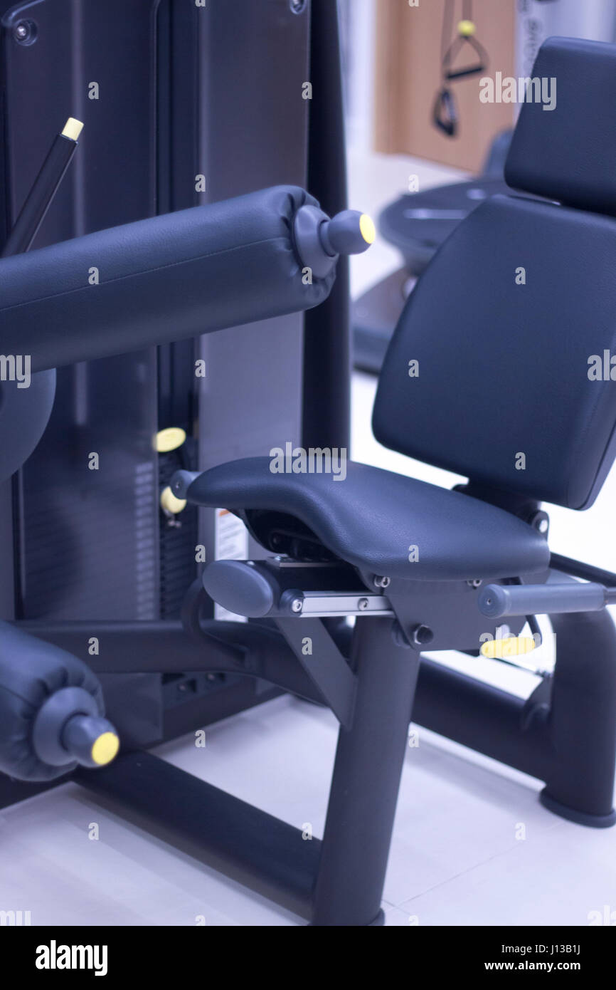 Poids de la jambe pour extension quadriceps et ischio-jambiers curl pour appareil d'entraînement de résistance. luttre Banque D'Images