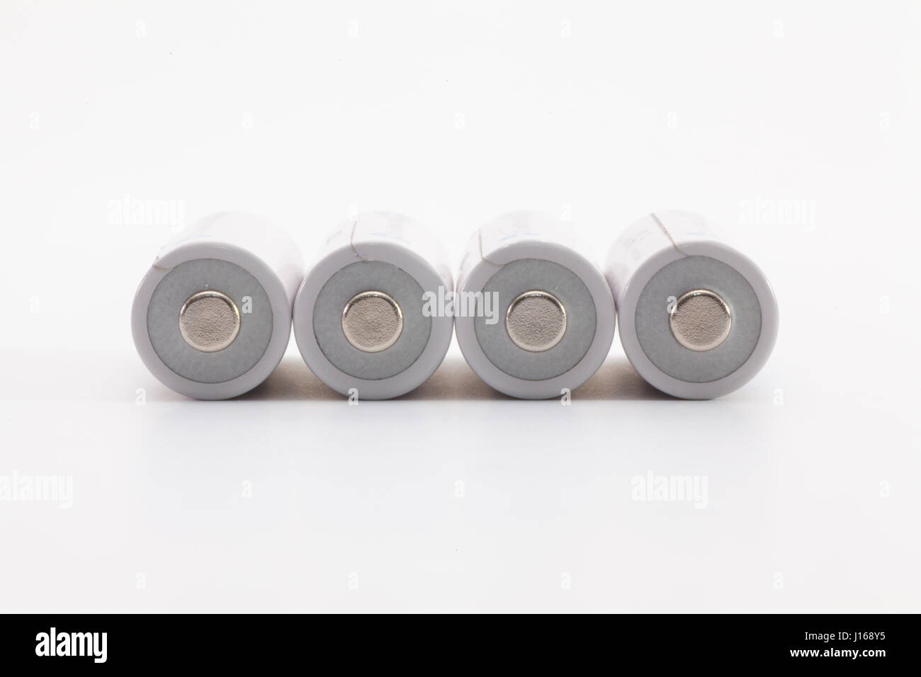 Résumé Contexte L'énergie des piles. blanc Pile alcaline AA. Banque D'Images