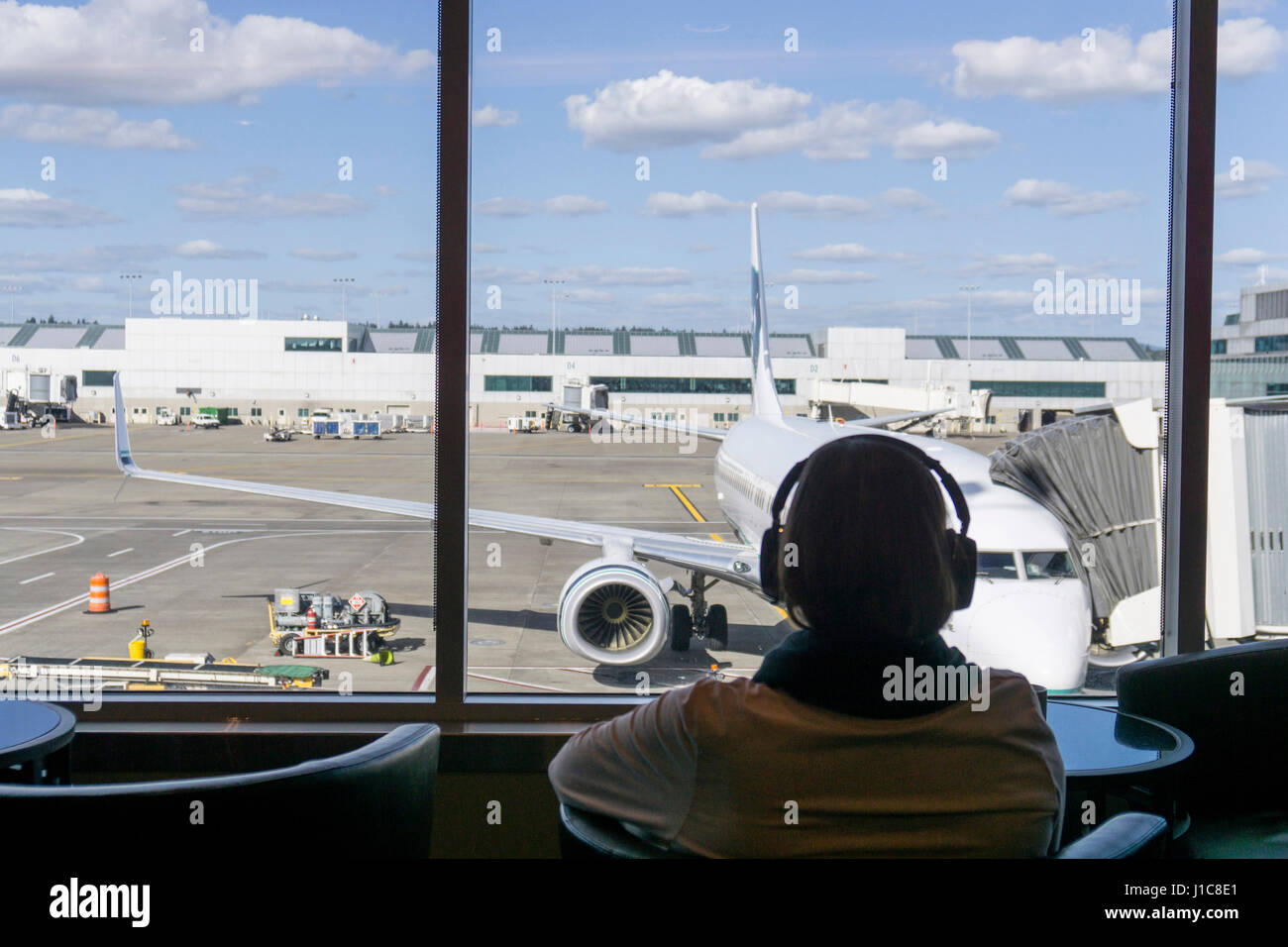 De passagers à l'aéroport Banque D'Images