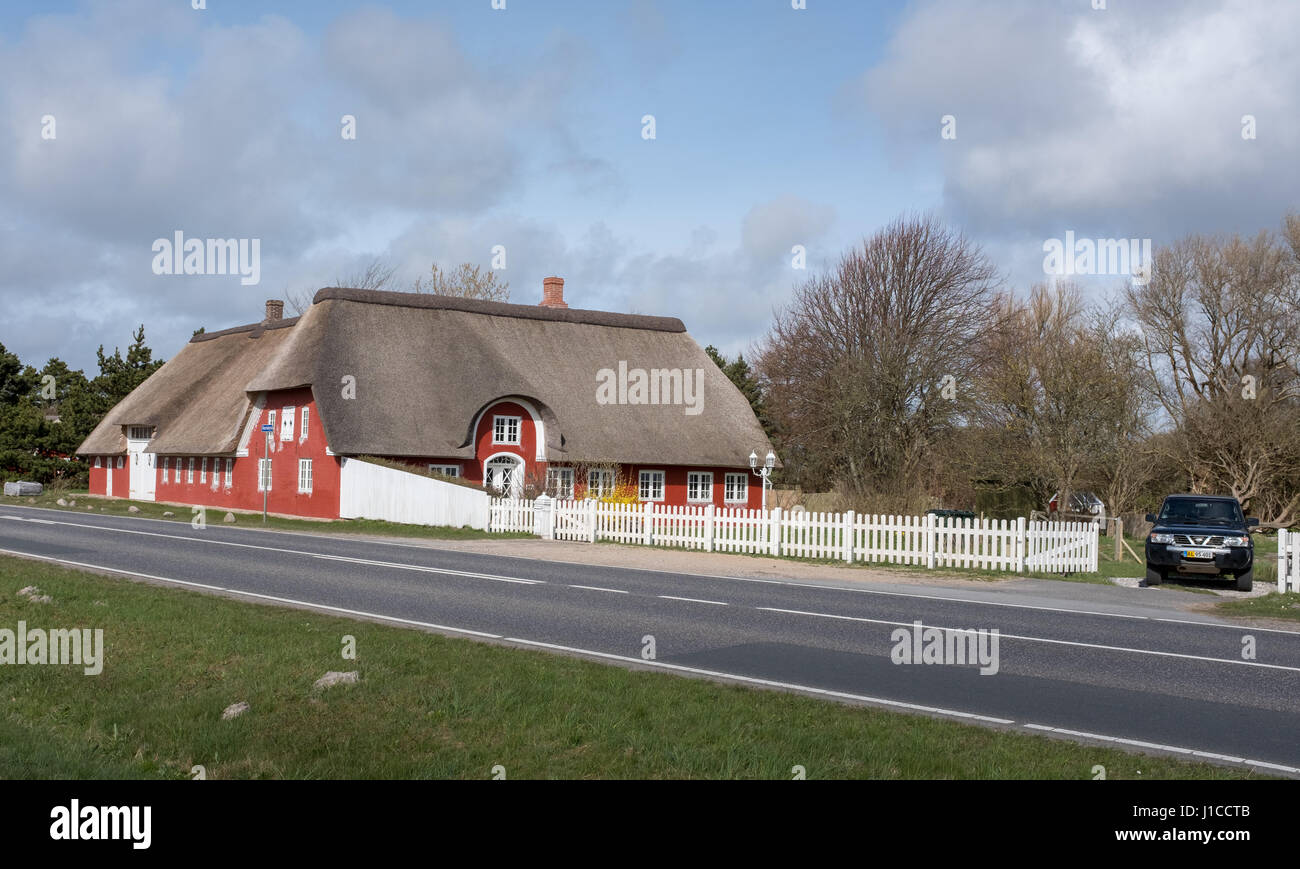 Maisons rouges traditionnel sur Paris, une île danoise dans l'UNESCO a désigné site du patrimoine mondial, la mer des Wadden, qui est le plus grand parc naturel du Danemark. Banque D'Images