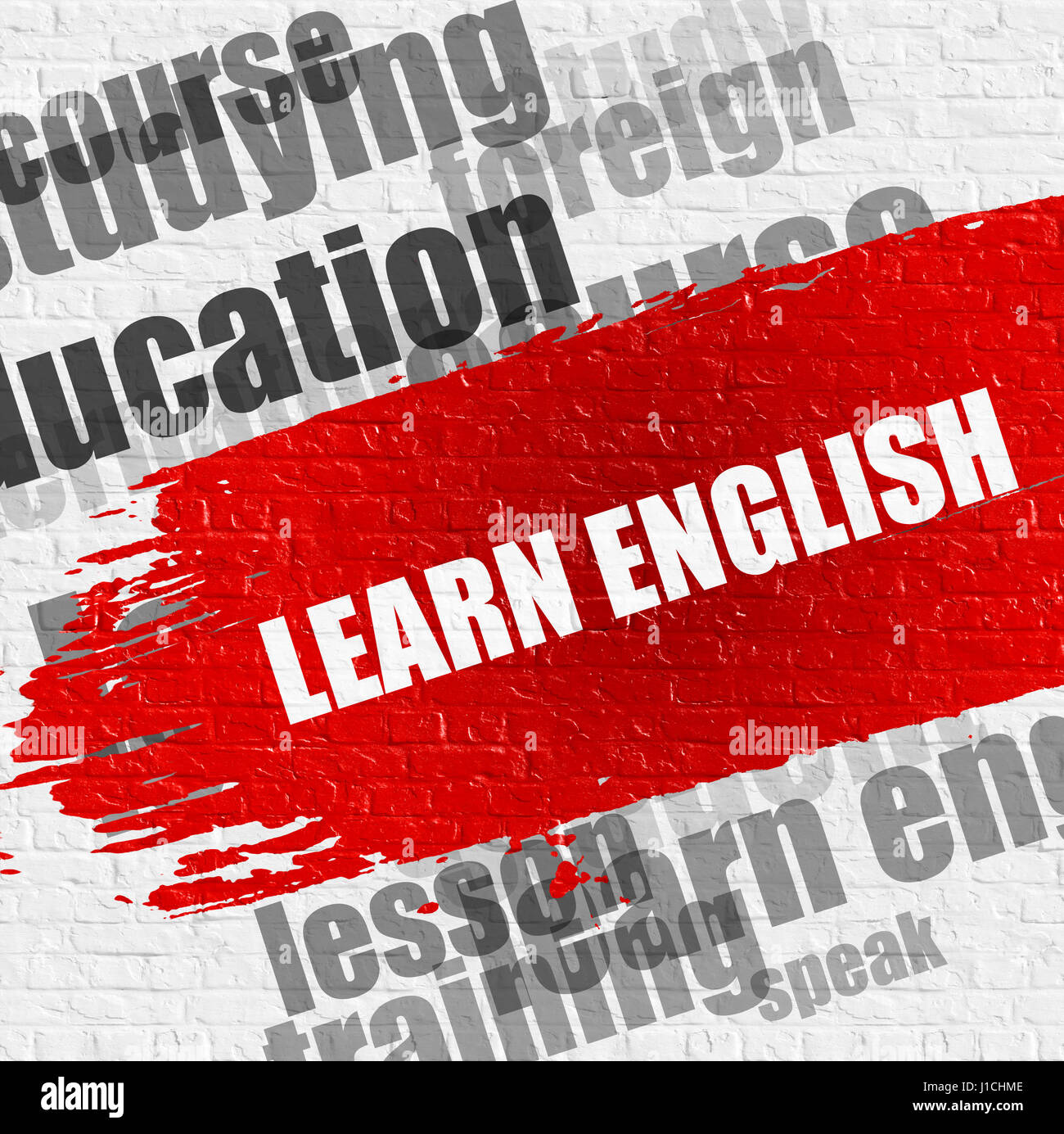 Apprendre l'anglais sur mur de brique. Banque D'Images