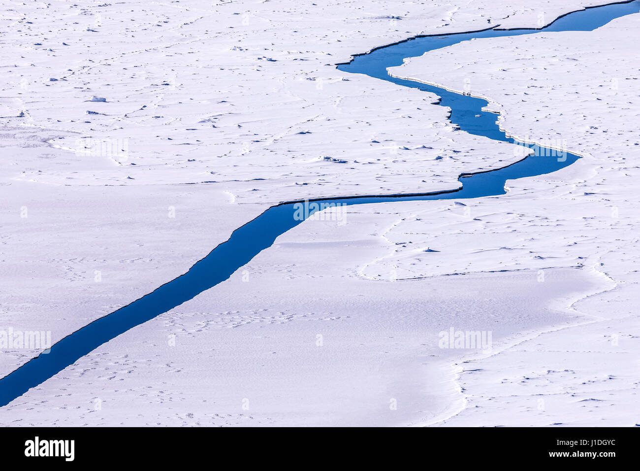 Une fissure dans la glace des inlandsis à l', Fjord glacé d'Ilulissat, Groenland. Banque D'Images