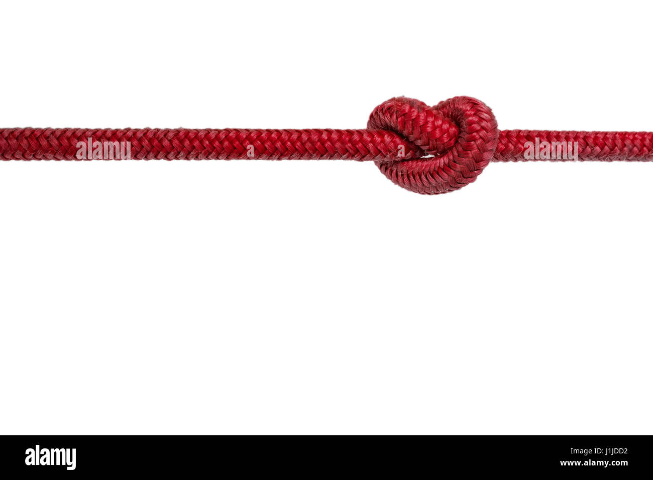Corde rouge avec noeud - corde nouée sur fond blanc Banque D'Images