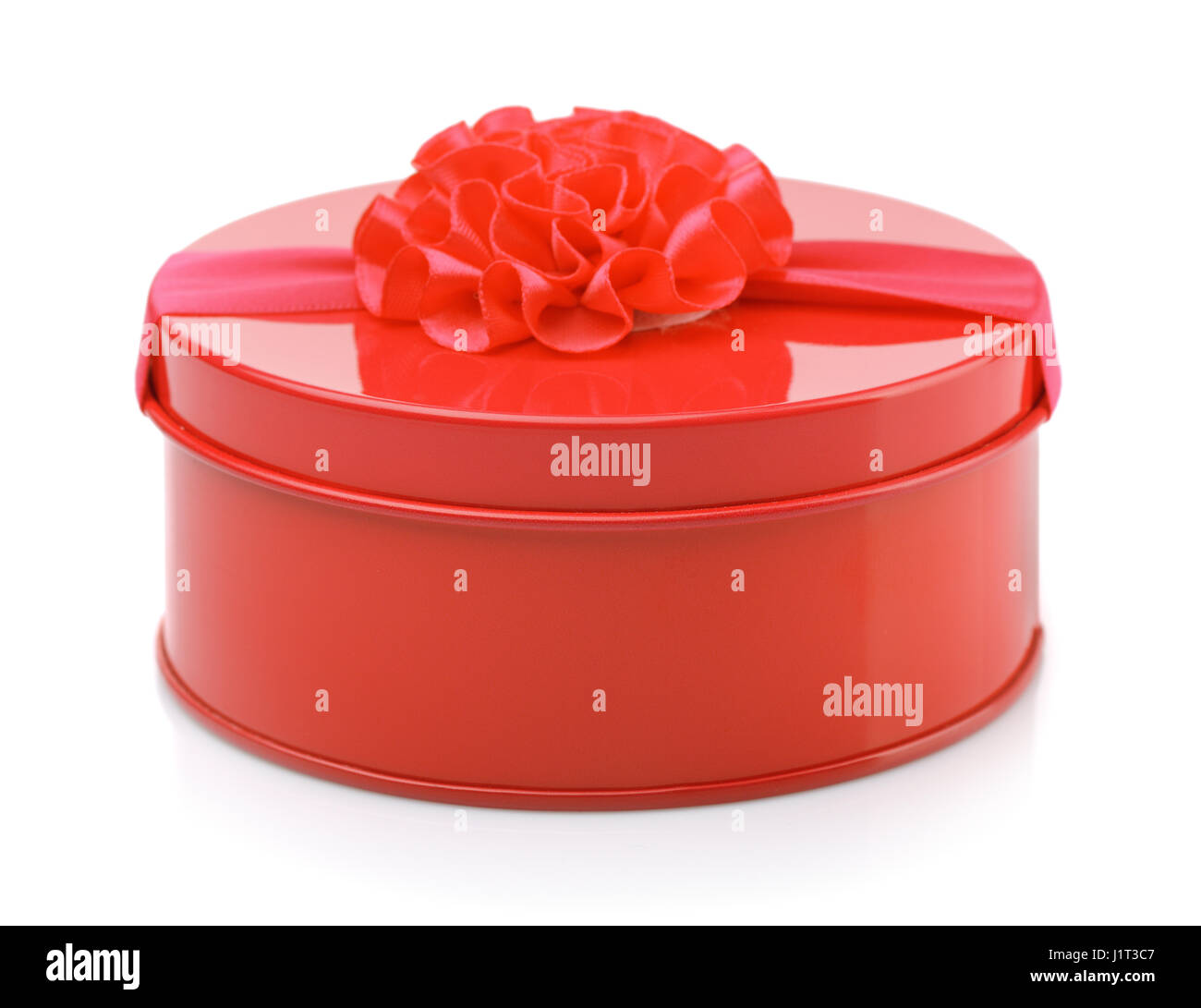 Boîte cadeau ronde métal rouge isolated on white Banque D'Images