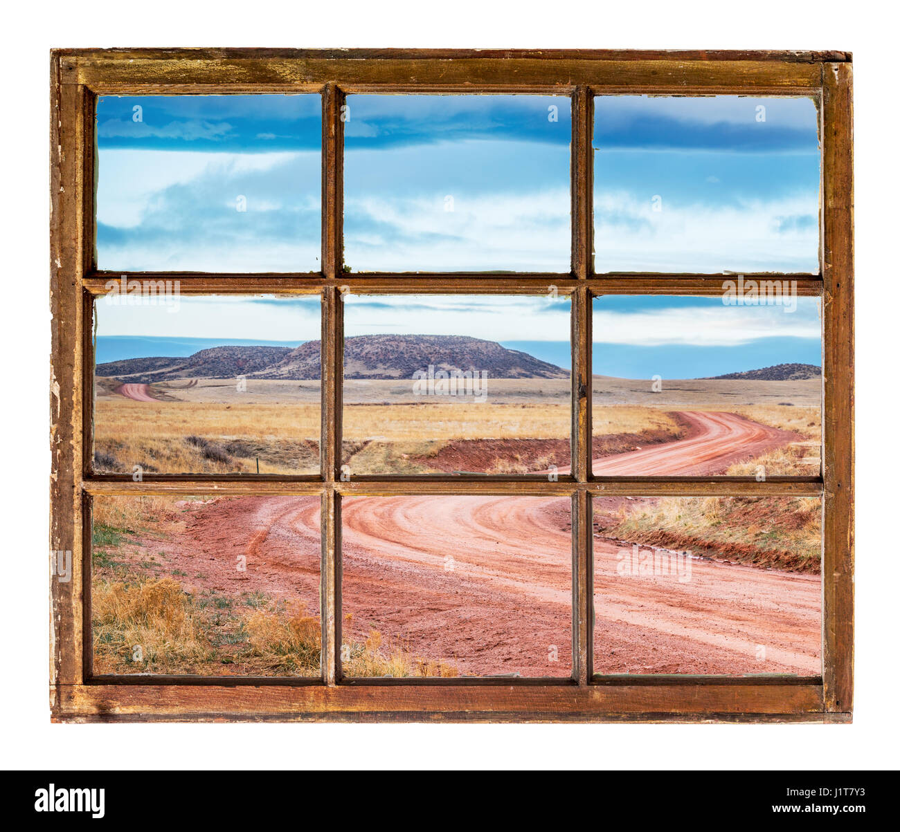 Windy ranch road dans le Colorado comme vu par foothills vintage, grunge, fenêtre à guillotine avec vitre sale Banque D'Images