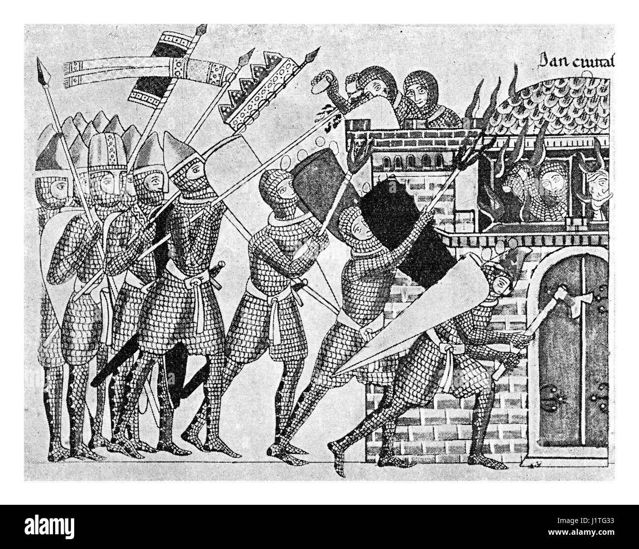 XII siècle : les guerriers attaquer une tour Banque D'Images