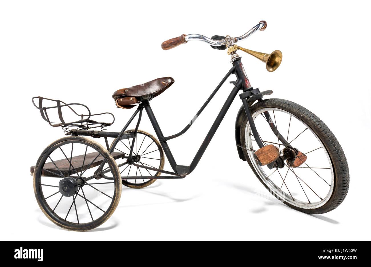 Vieux vélo dans le style rétro sur fond blanc Banque D'Images