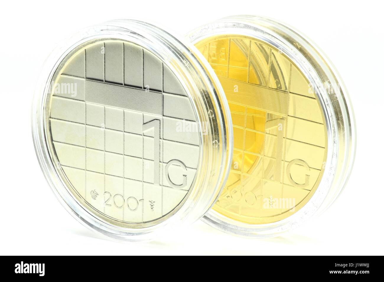 Des questions d'or et d'argent du florin néerlandais 1 coin isolé sur fond blanc Banque D'Images