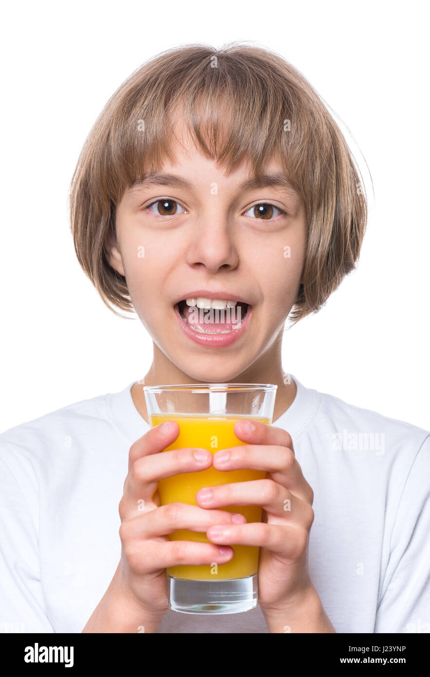 Girl drinking orange juice Banque D'Images