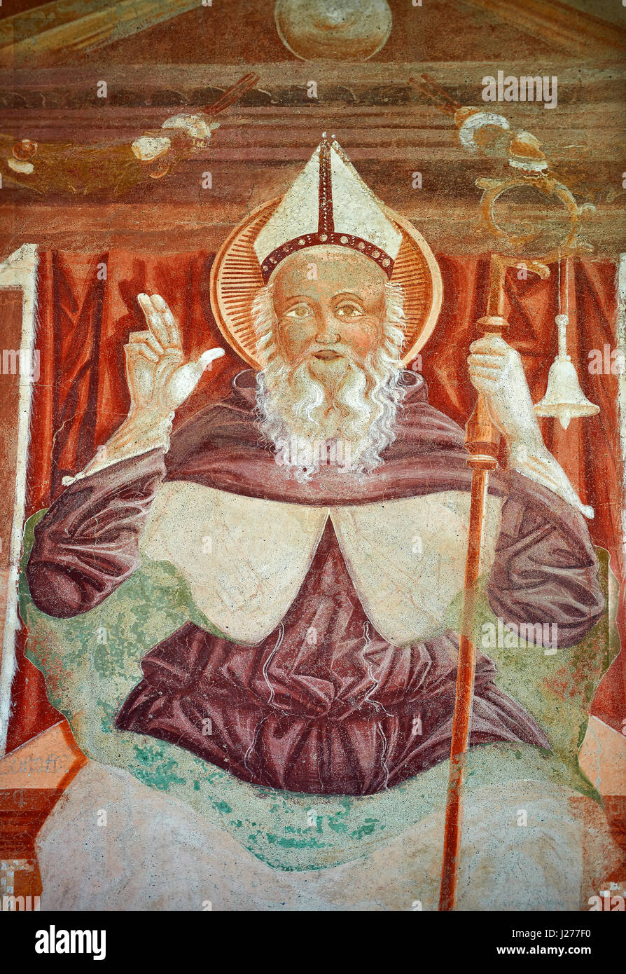 Peinture murale religieuse de saint Antonio Abate un un trône au-dessus avec les symboles d'une canonique bell et Porcinet, au-dessus du portail principal, le programme ISDEN par Cristoforo J Banque D'Images